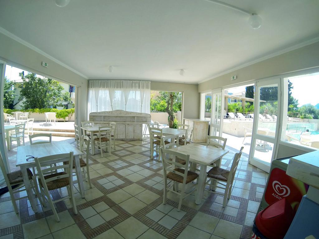 Happyland Hotel Apartments นีดรี ภายนอก รูปภาพ